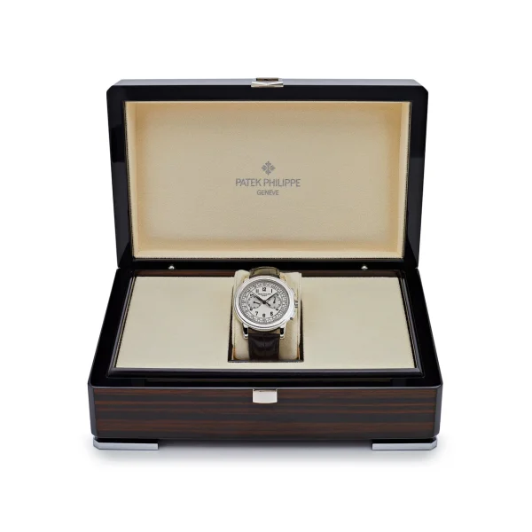 Watchbox-patek-philippe-complications-5070g-001-annual-calendar-chronograph-white-gold-silver-dial-2005-wbkswmu-exclusive-8.webp Watchbox-patek-philippe-complications-5070g-001-annual-calendar-chronograph-white-gold-silver-dial-2005-wbkswmu-exclusive-8.webp
