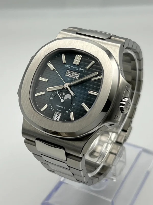 Watchbox-patek-philippe-nautilus-5726-1a-tiffany-co-moon-phase-stainless-steel-blue-dial-wb3je9j-exclusive-4.webp Watchbox-patek-philippe-nautilus-5726-1a-tiffany-co-moon-phase-stainless-steel-blue-dial-wb3je9j-exclusive-4.webp